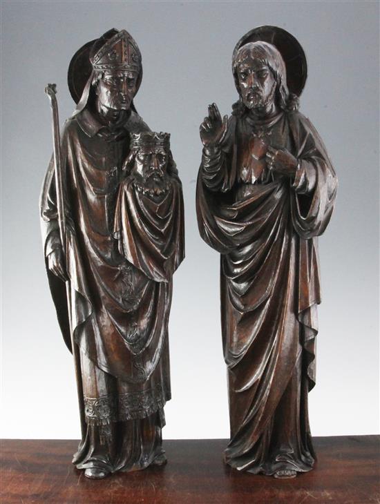 A pair of 19th century Flemish carved oak figures of Christ and a Bishop, 25.5in.